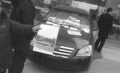 车主质疑所购新车曾翻新 遭4S店员工单挑